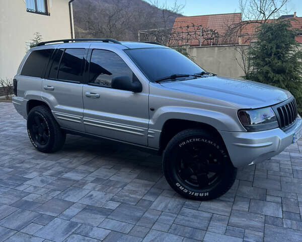 Серый Джип Гранд Чероки, объемом двигателя 2.7 л и пробегом 260 тыс. км за 11700 $, фото 2 на Automoto.ua