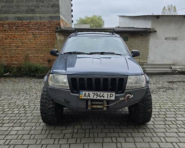 Серый Джип Гранд Чероки, объемом двигателя 4.7 л и пробегом 219 тыс. км за 9000 $, фото 6 на Automoto.ua