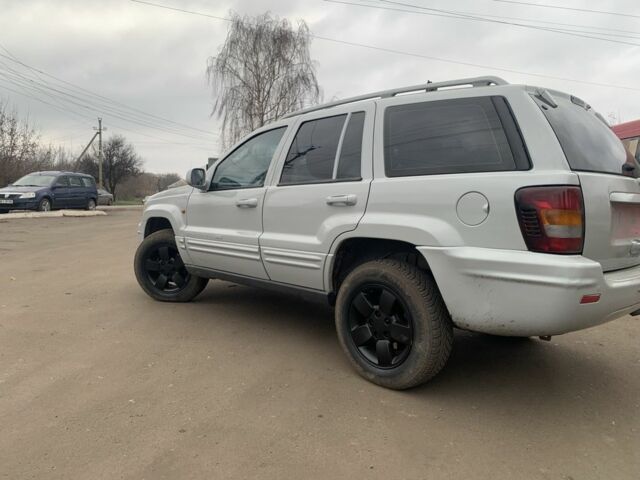 Сірий Джип Grand Cherokee, об'ємом двигуна 2.7 л та пробігом 186 тис. км за 3200 $, фото 4 на Automoto.ua