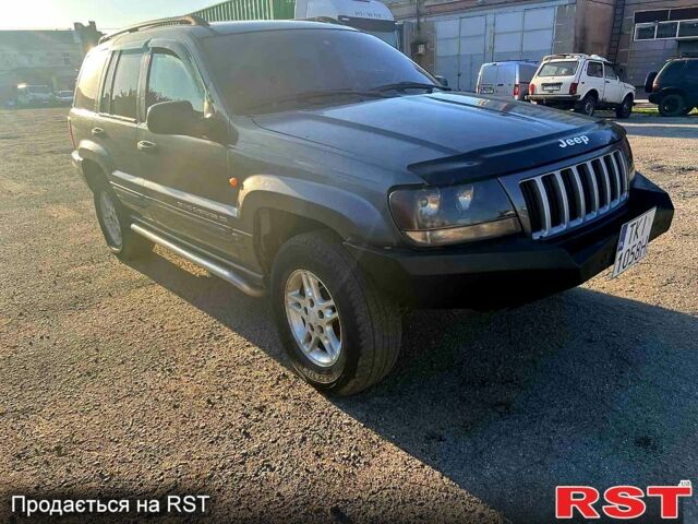 Сірий Джип Grand Cherokee, об'ємом двигуна 4 л та пробігом 274 тис. км за 2700 $, фото 2 на Automoto.ua