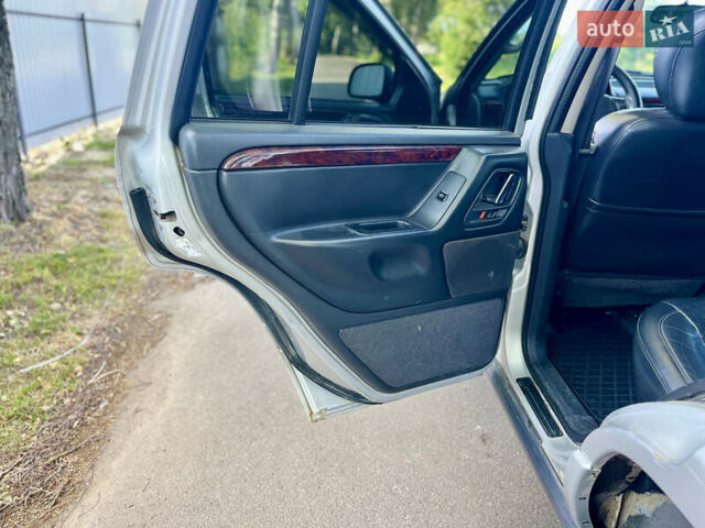 Сірий Джип Grand Cherokee, об'ємом двигуна 2.69 л та пробігом 343 тис. км за 8100 $, фото 25 на Automoto.ua