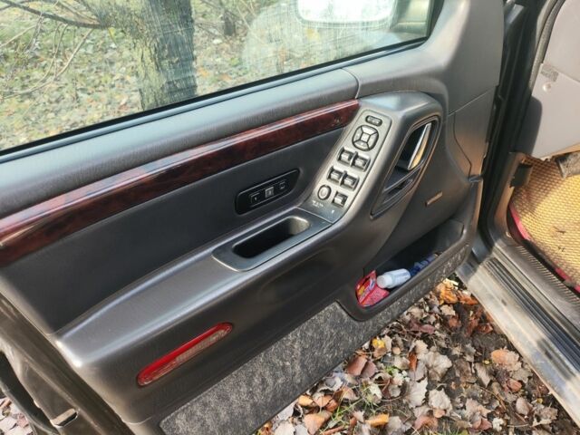 Сірий Джип Grand Cherokee, об'ємом двигуна 3.1 л та пробігом 420 тис. км за 3600 $, фото 3 на Automoto.ua