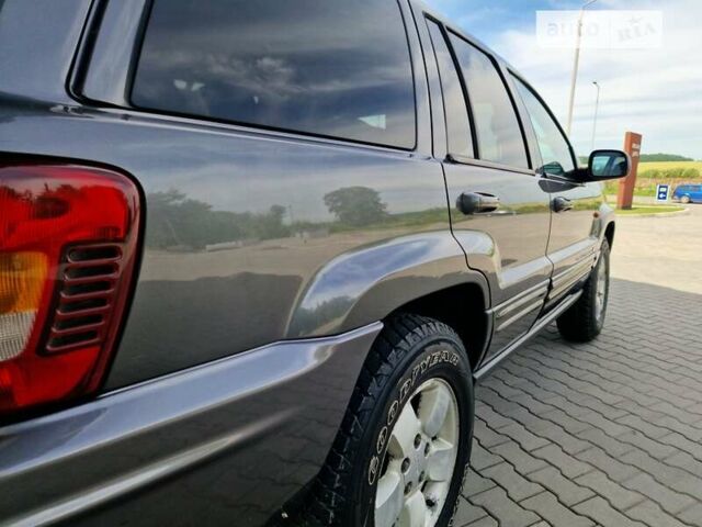 Сірий Джип Grand Cherokee, об'ємом двигуна 2.7 л та пробігом 300 тис. км за 8550 $, фото 31 на Automoto.ua