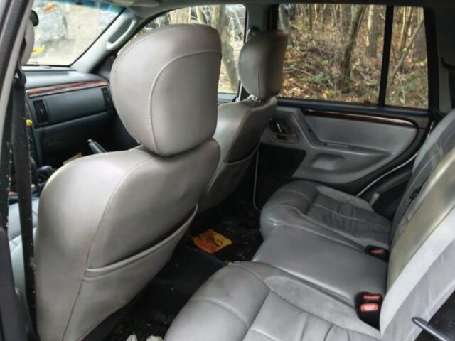 Серый Джип Гранд Чероки, объемом двигателя 2.7 л и пробегом 290 тыс. км за 3100 $, фото 7 на Automoto.ua