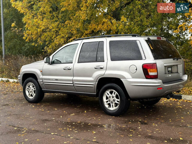 Серый Джип Гранд Чероки, объемом двигателя 2.7 л и пробегом 298 тыс. км за 5800 $, фото 3 на Automoto.ua