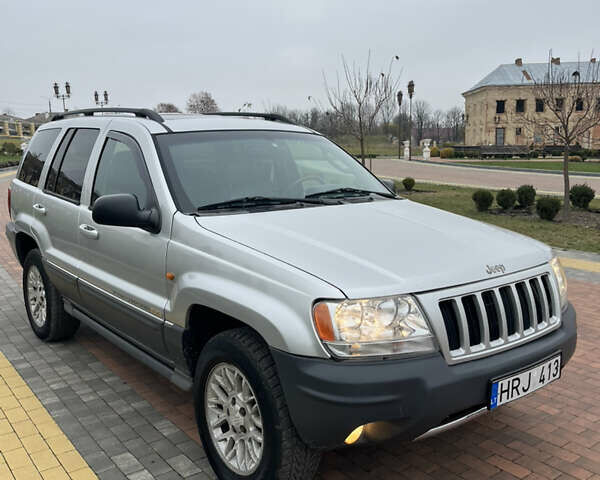 Серый Джип Гранд Чероки, объемом двигателя 2.69 л и пробегом 370 тыс. км за 5100 $, фото 3 на Automoto.ua