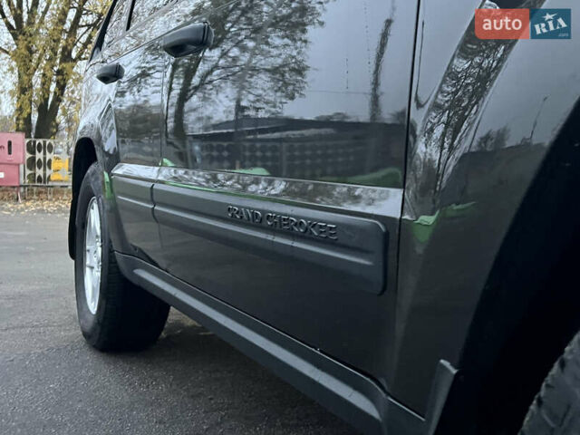 Серый Джип Гранд Чероки, объемом двигателя 3.7 л и пробегом 268 тыс. км за 6600 $, фото 19 на Automoto.ua