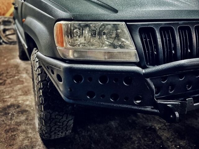 Сірий Джип Grand Cherokee, об'ємом двигуна 2.7 л та пробігом 366 тис. км за 10500 $, фото 2 на Automoto.ua