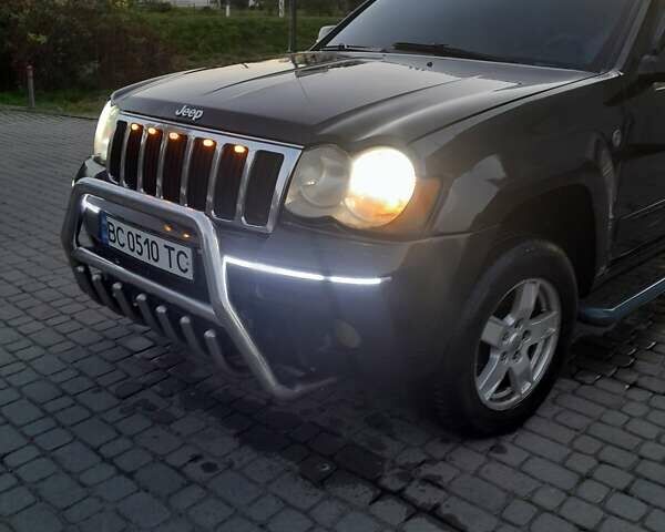 Сірий Джип Grand Cherokee, об'ємом двигуна 4.7 л та пробігом 190 тис. км за 8600 $, фото 1 на Automoto.ua