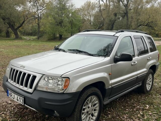 Серый Джип Гранд Чероки, объемом двигателя 2.7 л и пробегом 360 тыс. км за 5550 $, фото 1 на Automoto.ua
