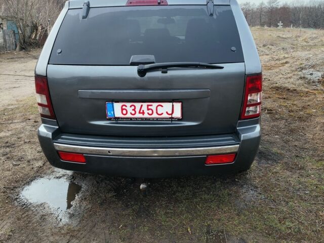 Серый Джип Гранд Чероки, объемом двигателя 3 л и пробегом 352 тыс. км за 6000 $, фото 3 на Automoto.ua