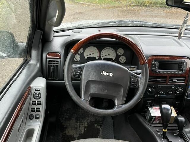 Сірий Джип Grand Cherokee, об'ємом двигуна 2.7 л та пробігом 320 тис. км за 5500 $, фото 7 на Automoto.ua