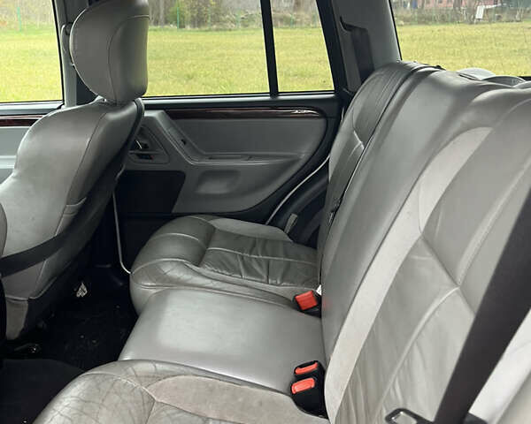 Серый Джип Гранд Чероки, объемом двигателя 2.69 л и пробегом 370 тыс. км за 5100 $, фото 11 на Automoto.ua