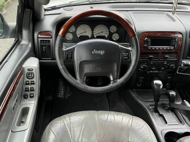 Сірий Джип Grand Cherokee, об'ємом двигуна 2.7 л та пробігом 355 тис. км за 5350 $, фото 7 на Automoto.ua