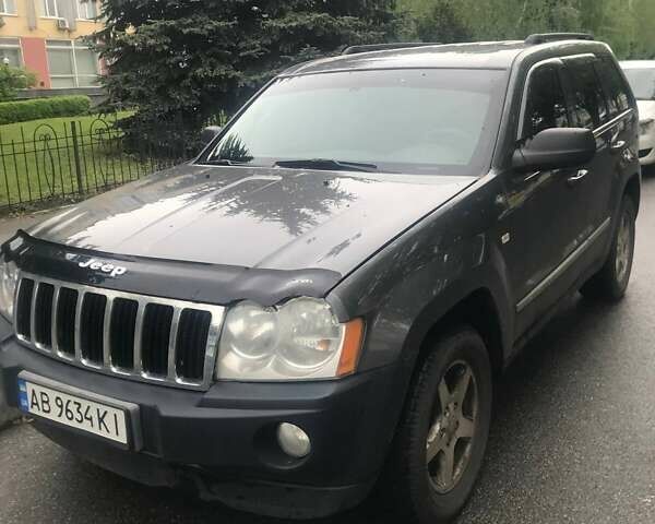 Серый Джип Гранд Чероки, объемом двигателя 4.7 л и пробегом 197 тыс. км за 8990 $, фото 1 на Automoto.ua