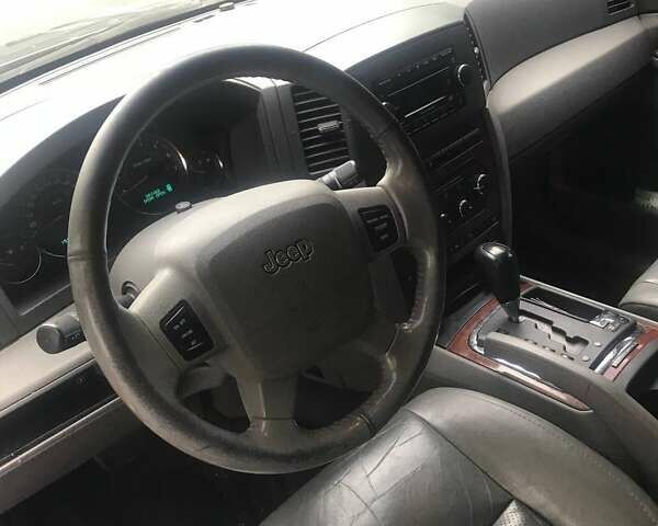 Серый Джип Гранд Чероки, объемом двигателя 4.7 л и пробегом 197 тыс. км за 8990 $, фото 3 на Automoto.ua