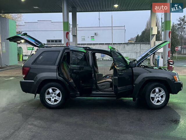 Серый Джип Гранд Чероки, объемом двигателя 3.7 л и пробегом 268 тыс. км за 6600 $, фото 56 на Automoto.ua