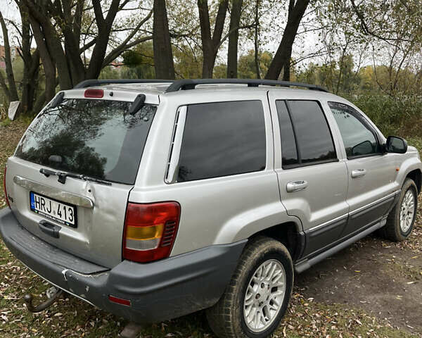 Сірий Джип Grand Cherokee, об'ємом двигуна 2.7 л та пробігом 370 тис. км за 5650 $, фото 4 на Automoto.ua