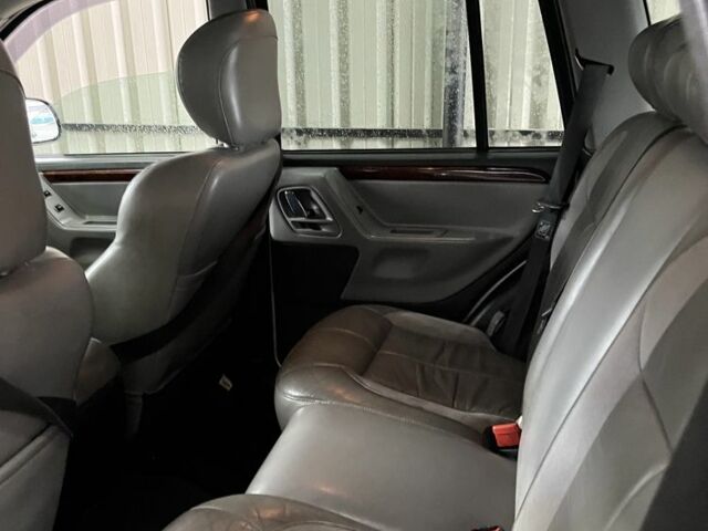 Сірий Джип Grand Cherokee, об'ємом двигуна 2.7 л та пробігом 350 тис. км за 5350 $, фото 7 на Automoto.ua