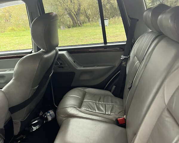 Сірий Джип Grand Cherokee, об'ємом двигуна 2.7 л та пробігом 370 тис. км за 5650 $, фото 5 на Automoto.ua