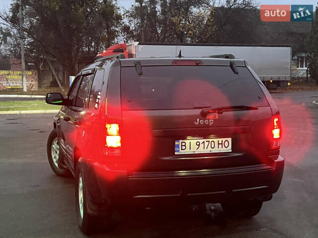 Серый Джип Гранд Чероки, объемом двигателя 3.7 л и пробегом 268 тыс. км за 6600 $, фото 60 на Automoto.ua