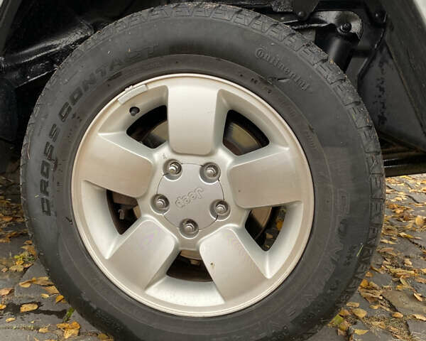 Джип Grand Cherokee 2006 у Житомирі на Automoto.ua Сірий Джип Grand Cherokee, об'ємом двигуна 3 л та пробігом 243 тис. км за 9999 $, фото 40 на Automoto.ua