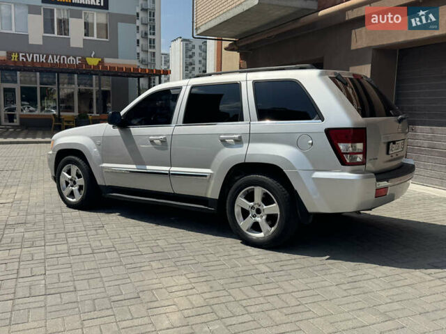 Сірий Джип Grand Cherokee, об'ємом двигуна 5.65 л та пробігом 242 тис. км за 9000 $, фото 4 на Automoto.ua