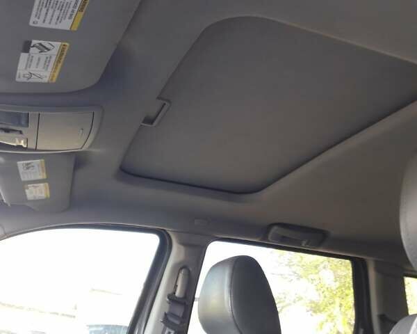 Серый Джип Гранд Чероки, объемом двигателя 5.65 л и пробегом 171 тыс. км за 10800 $, фото 3 на Automoto.ua