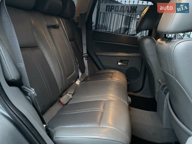 Сірий Джип Grand Cherokee, об'ємом двигуна 5.7 л та пробігом 205 тис. км за 11999 $, фото 9 на Automoto.ua