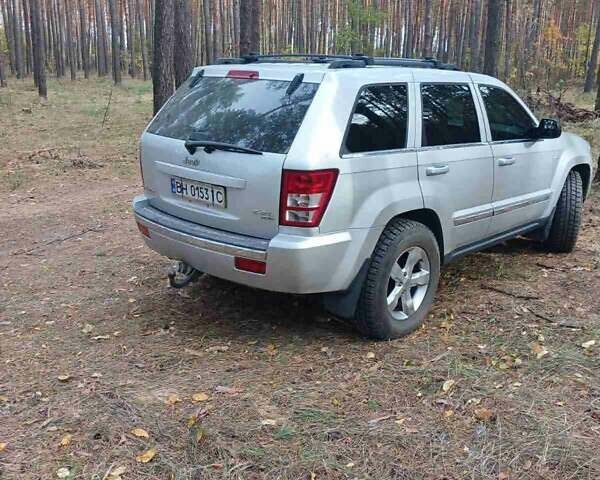 Серый Джип Гранд Чероки, объемом двигателя 5.65 л и пробегом 171 тыс. км за 10800 $, фото 1 на Automoto.ua