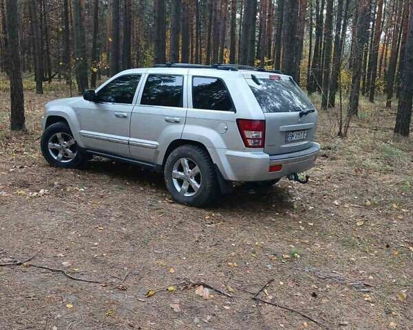 Серый Джип Гранд Чероки, объемом двигателя 5.65 л и пробегом 171 тыс. км за 10800 $, фото 2 на Automoto.ua