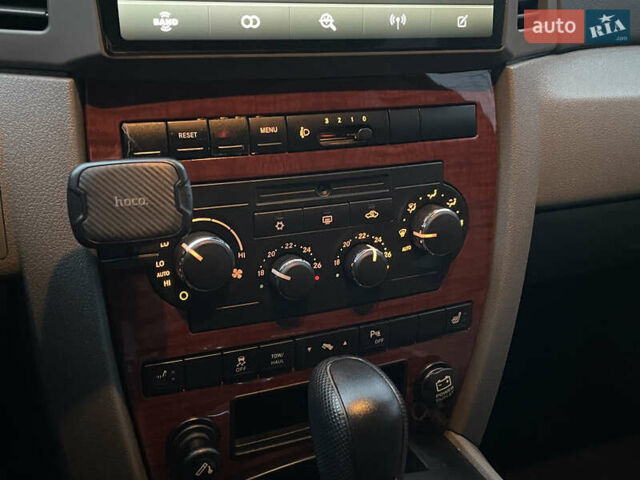 Сірий Джип Grand Cherokee, об'ємом двигуна 5.7 л та пробігом 205 тис. км за 11999 $, фото 17 на Automoto.ua