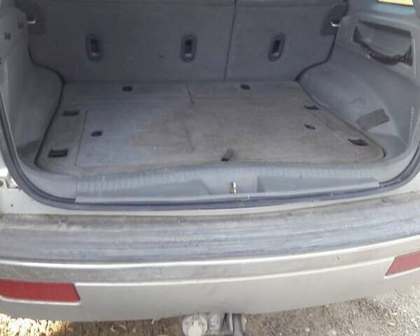 Серый Джип Гранд Чероки, объемом двигателя 5.65 л и пробегом 171 тыс. км за 10800 $, фото 6 на Automoto.ua