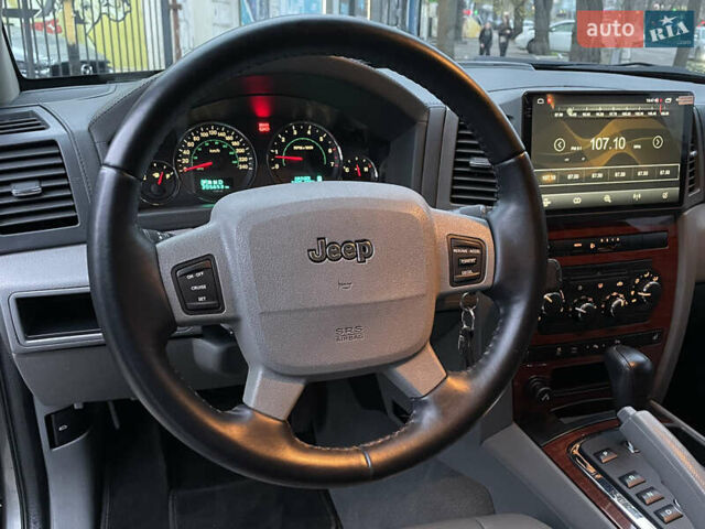 Сірий Джип Grand Cherokee, об'ємом двигуна 5.7 л та пробігом 205 тис. км за 11999 $, фото 13 на Automoto.ua