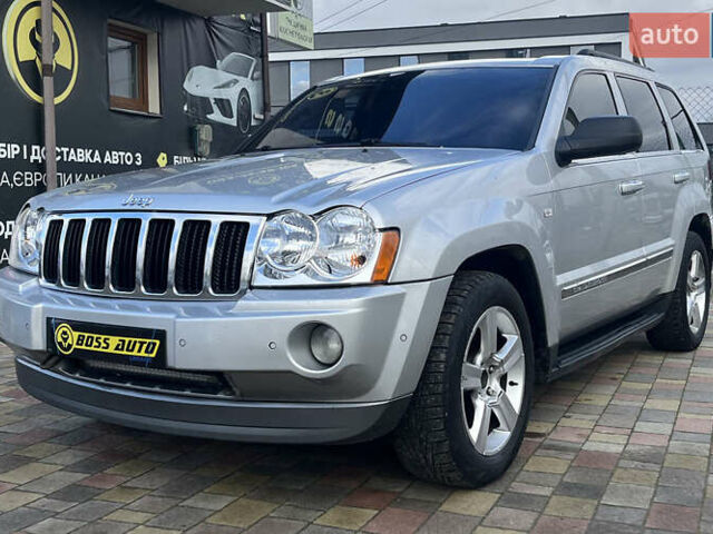 Серый Джип Гранд Чероки, объемом двигателя 5.65 л и пробегом 244 тыс. км за 9200 $, фото 2 на Automoto.ua