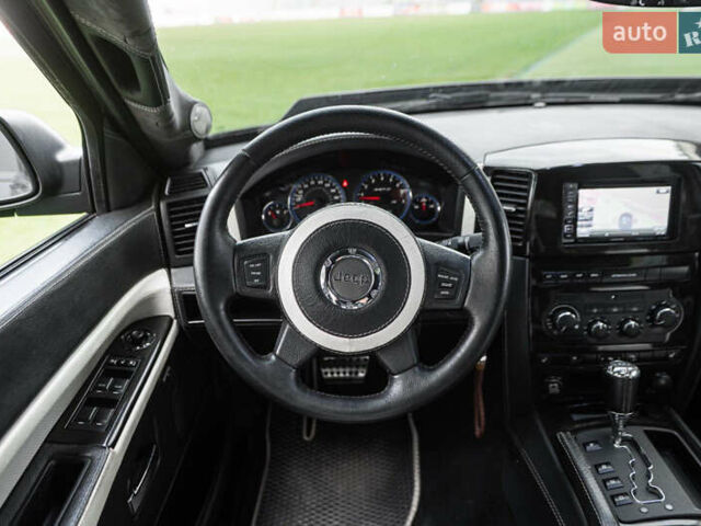 Серый Джип Гранд Чероки, объемом двигателя 6.06 л и пробегом 154 тыс. км за 15900 $, фото 24 на Automoto.ua