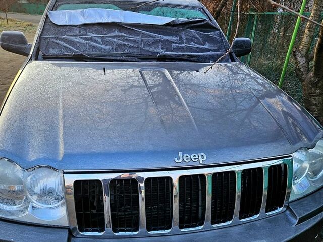 Серый Джип Гранд Чероки, объемом двигателя 3 л и пробегом 347 тыс. км за 9000 $, фото 4 на Automoto.ua