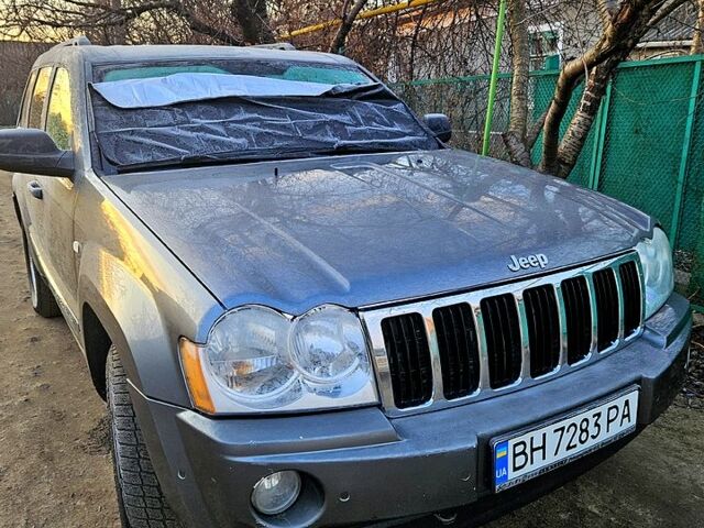 Серый Джип Гранд Чероки, объемом двигателя 3 л и пробегом 347 тыс. км за 9000 $, фото 1 на Automoto.ua