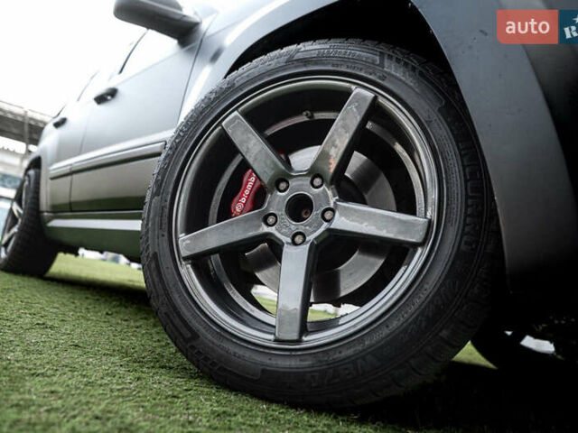 Серый Джип Гранд Чероки, объемом двигателя 6.06 л и пробегом 154 тыс. км за 14900 $, фото 5 на Automoto.ua