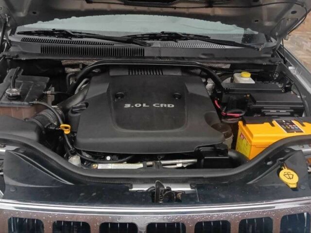 Серый Джип Гранд Чероки, объемом двигателя 3 л и пробегом 480 тыс. км за 8900 $, фото 4 на Automoto.ua