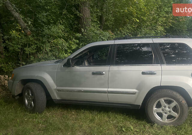 Сірий Джип Grand Cherokee, об'ємом двигуна 4.7 л та пробігом 352 тис. км за 12000 $, фото 4 на Automoto.ua