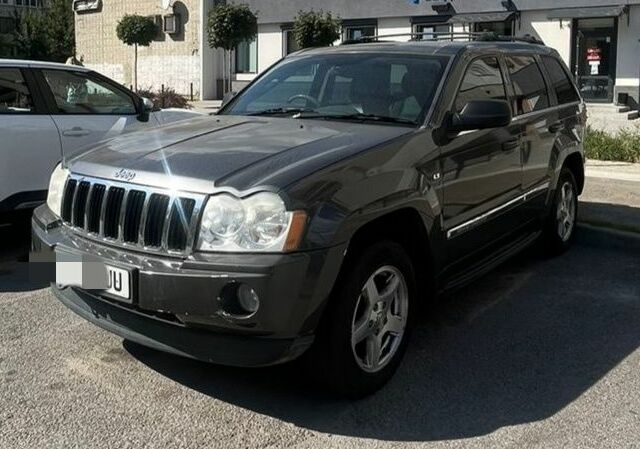 Сірий Джип Grand Cherokee, об'ємом двигуна 0 л та пробігом 200 тис. км за 3600 $, фото 1 на Automoto.ua