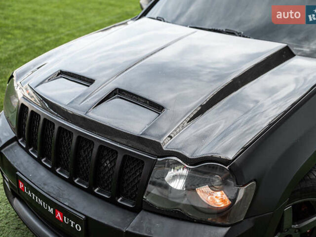 Серый Джип Гранд Чероки, объемом двигателя 6.06 л и пробегом 154 тыс. км за 15900 $, фото 1 на Automoto.ua