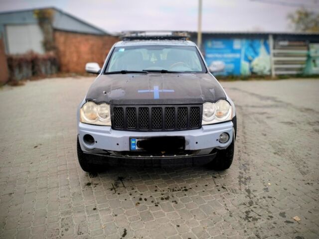 Серый Джип Гранд Чероки, объемом двигателя 3 л и пробегом 379 тыс. км за 7300 $, фото 2 на Automoto.ua