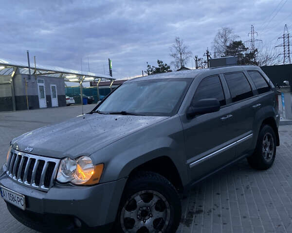 Сірий Джип Grand Cherokee, об'ємом двигуна 3.7 л та пробігом 245 тис. км за 8399 $, фото 1 на Automoto.ua