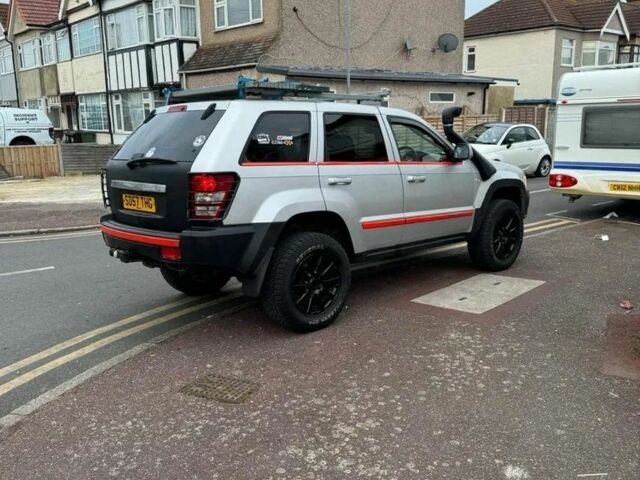 Сірий Джип Grand Cherokee, об'ємом двигуна 3 л та пробігом 200 тис. км за 7554 $, фото 3 на Automoto.ua