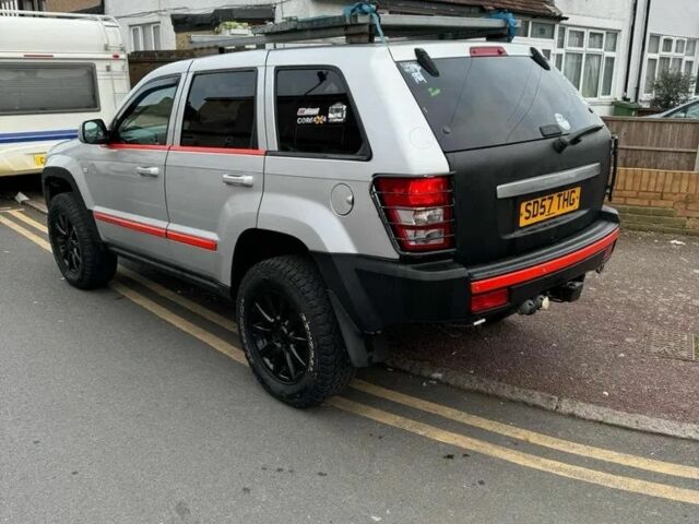 Сірий Джип Grand Cherokee, об'ємом двигуна 3 л та пробігом 200 тис. км за 7554 $, фото 2 на Automoto.ua