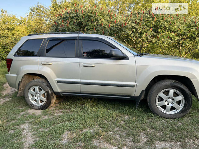 Сірий Джип Grand Cherokee, об'ємом двигуна 3.7 л та пробігом 270 тис. км за 10500 $, фото 1 на Automoto.ua