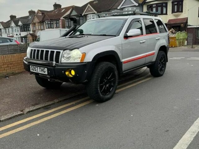 Сірий Джип Grand Cherokee, об'ємом двигуна 3 л та пробігом 200 тис. км за 7554 $, фото 1 на Automoto.ua