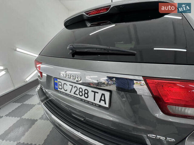 Сірий Джип Grand Cherokee, об'ємом двигуна 3 л та пробігом 164 тис. км за 18599 $, фото 116 на Automoto.ua